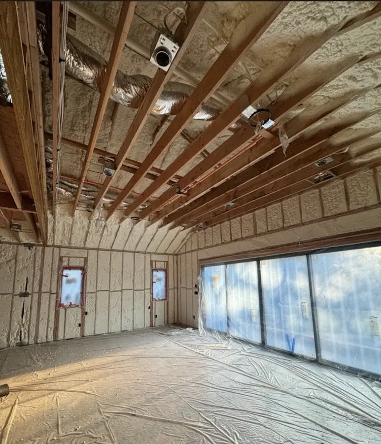 Interior walls and ceiling insulated with spray foam during new construction in Fort Mill